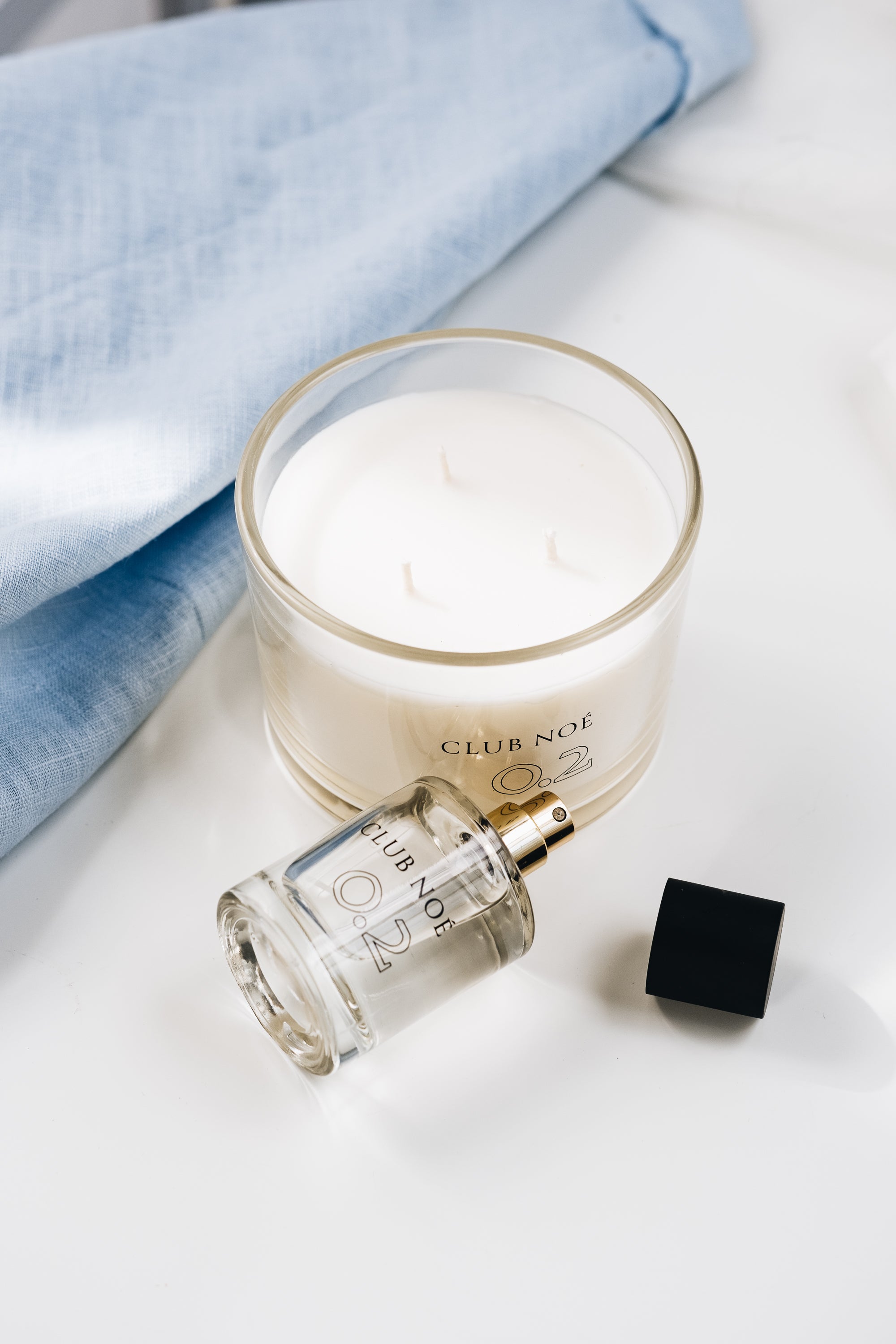 0.2 Soul Set bestehend aus 0.2 Eau de Parfum und 0.2 Duftkerze in durchsichtigem Glas, von Club Noe