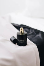 Clean Spirit Set bestehend aus der 0.2 Duftkerze und dem Black Parfum, von Club Noe